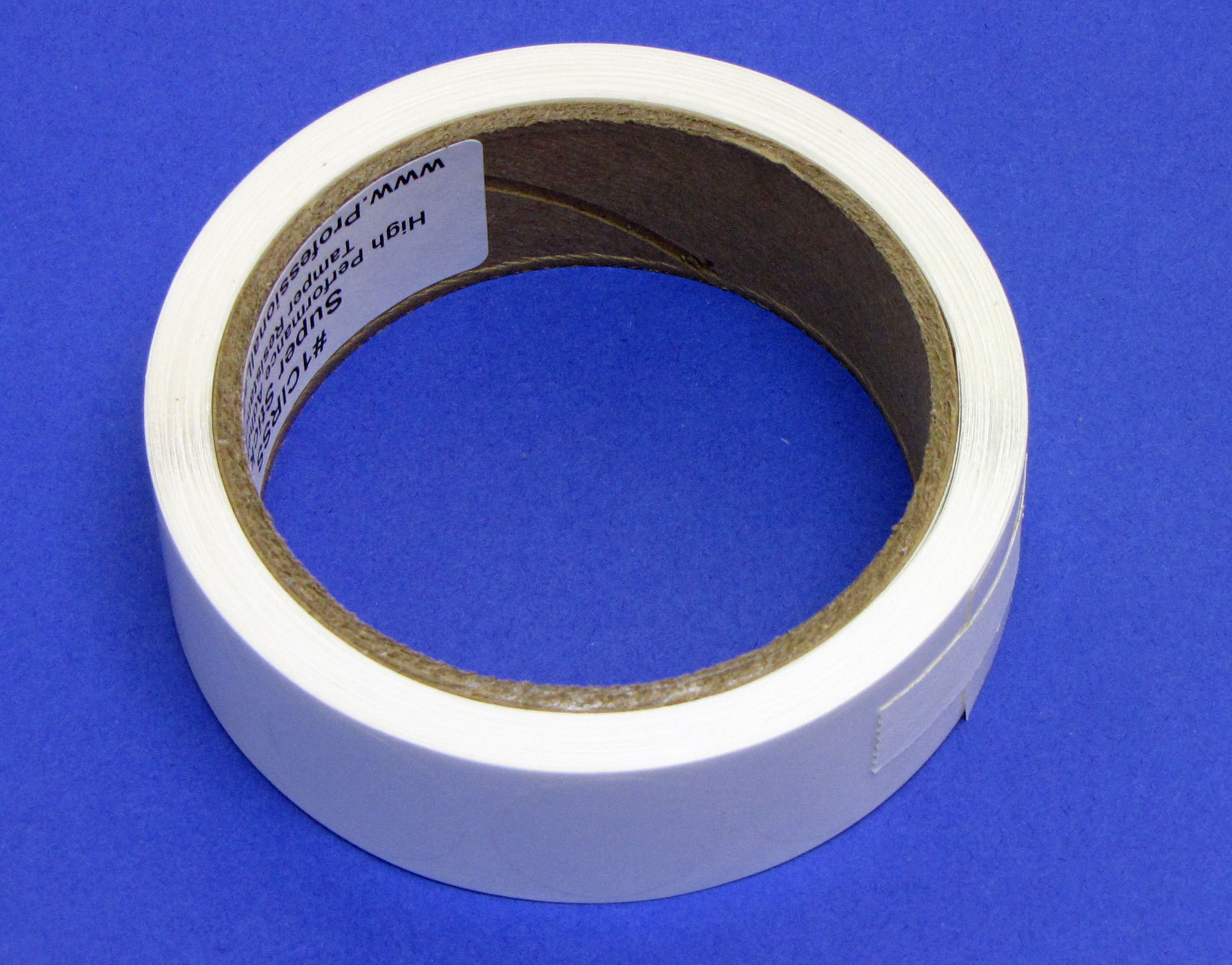 Super Stick label seals on a 3 inch core