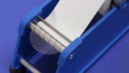 Label dispenser for Super Stick series labels and seals